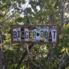 Bigger Boat license sign displayed in mangroves